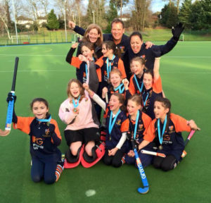 The OCHC Under-10  Girls celebrate winning the Surrey Minis Plate Championship, March 8, 2015